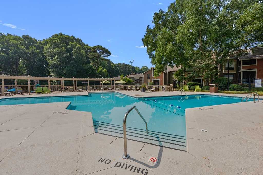 The Retreat at Lake Johnson Apartments - Photo 2 of 35