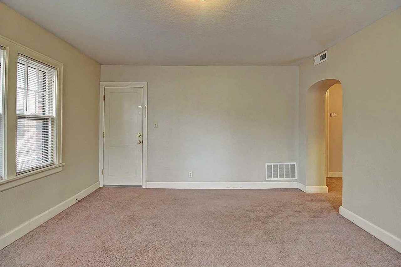 Historic Charm Meets Modern Comfort at Old English Court - Photo 5 of 13