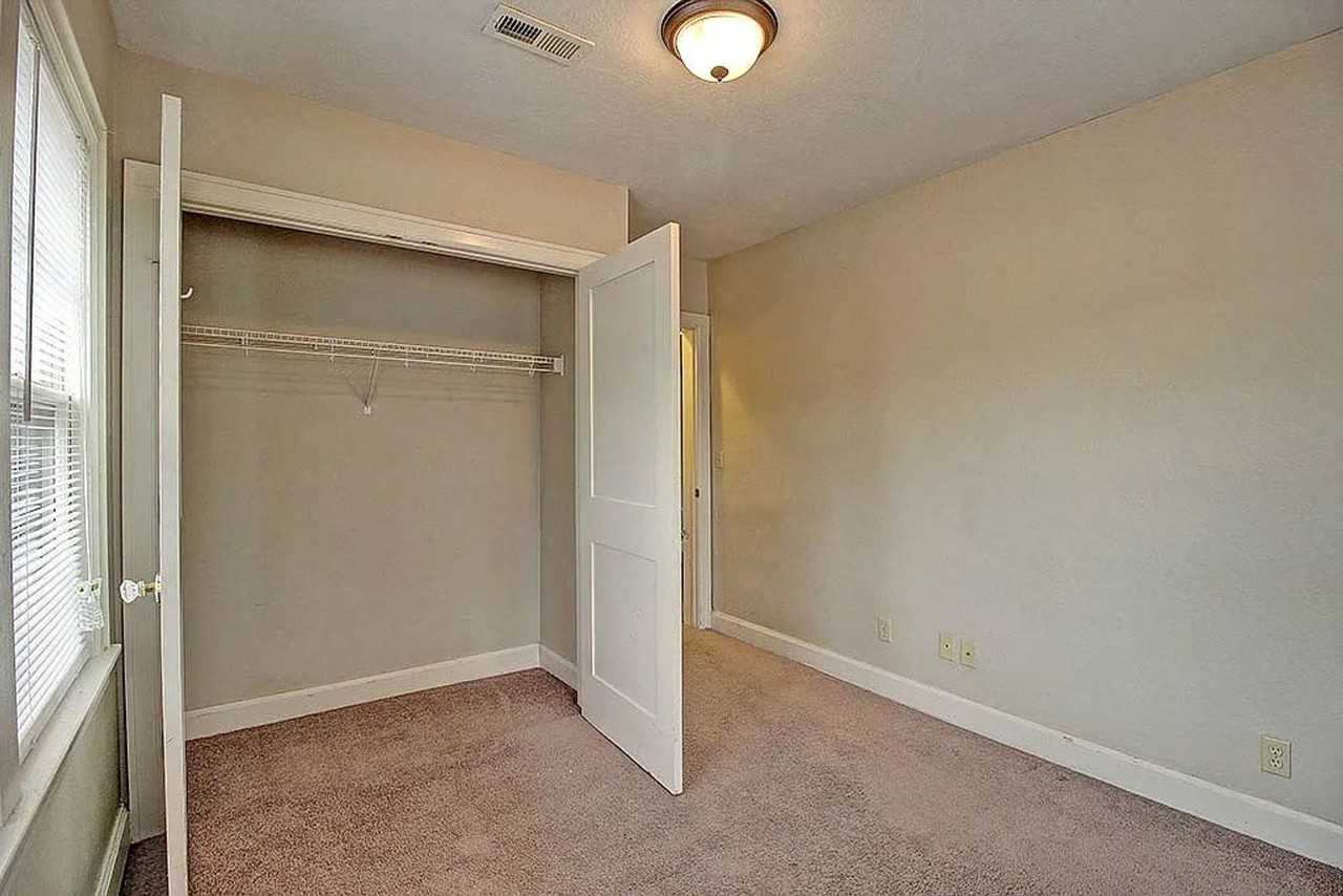 Historic Charm Meets Modern Comfort at Old English Court - Photo 7 of 13