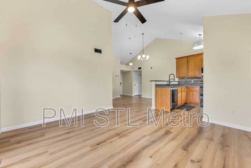 6303 Spring River Dr - Photo 3 of 39