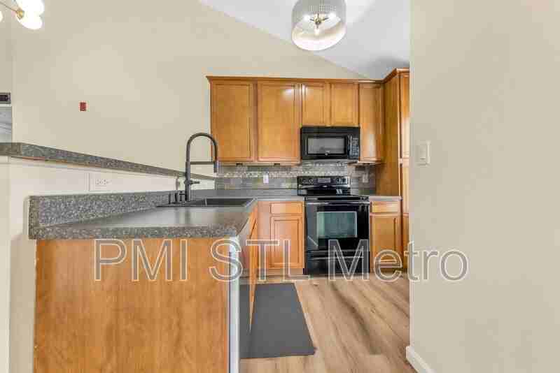 6303 Spring River Dr - Photo 5 of 37