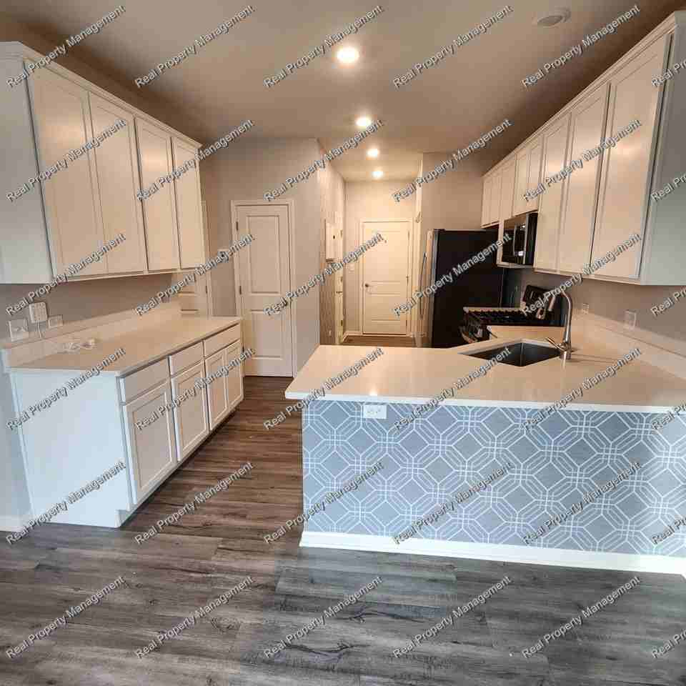 1915 E 110th Pl - Photo 7 of 20