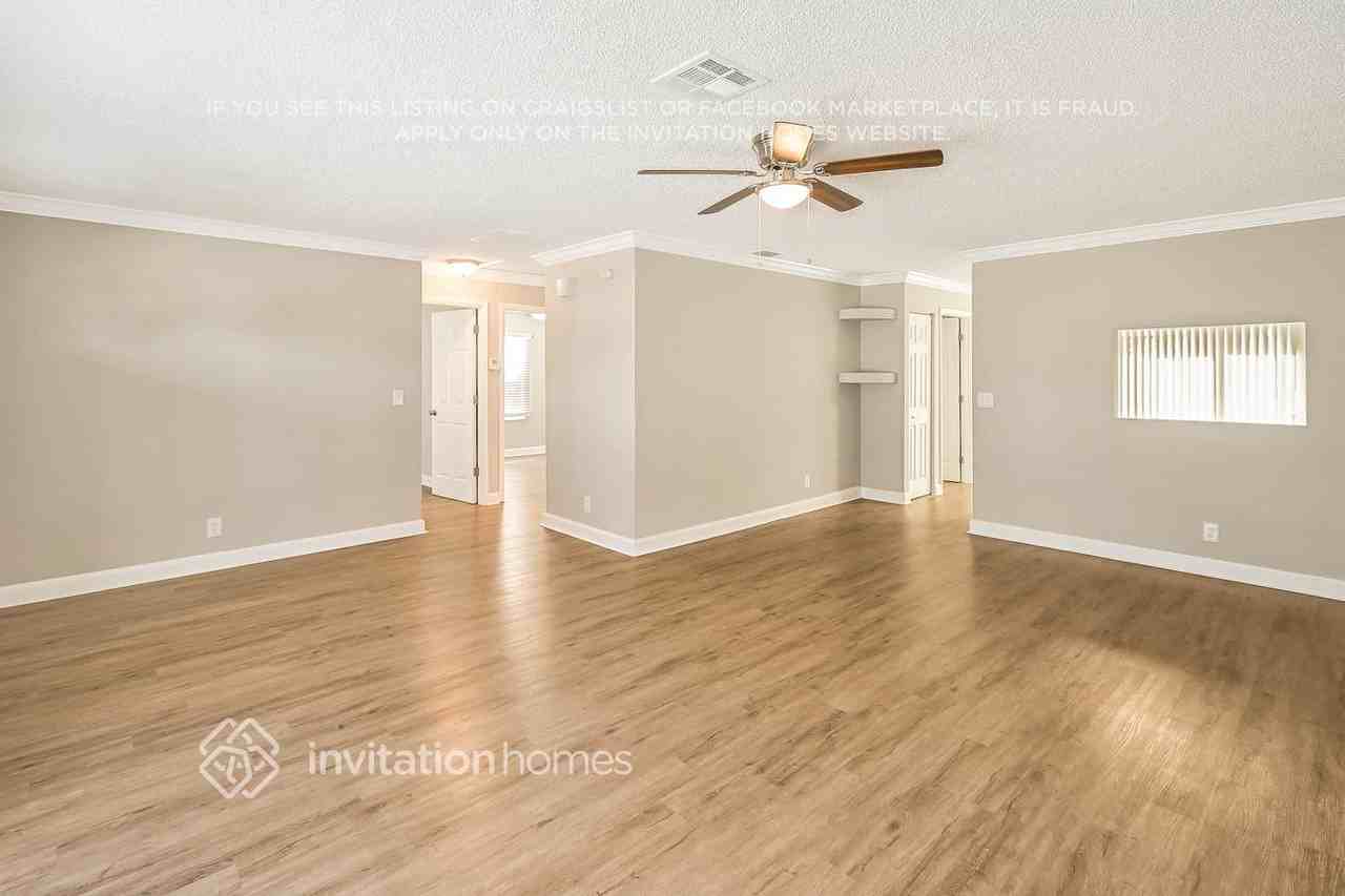 5940 Dewitt Pl - Photo 3 of 16