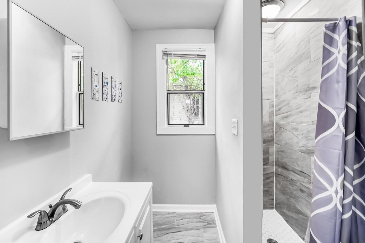 E 32nd St - Photo 2 of 29