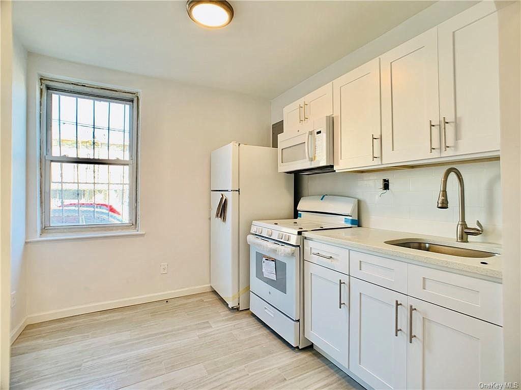 1531 Hammersley Ave #1P - Photo 2 of 5