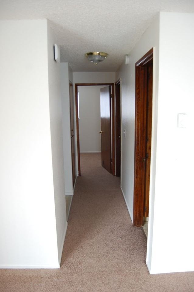 Spacious One & Two Bed Units in a Quite complex with Porches and Covered Off Street Parking - Photo 5 of 9