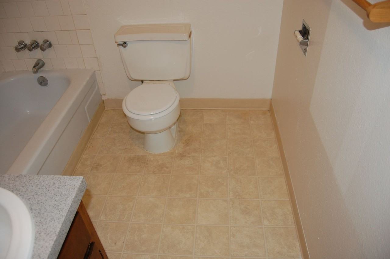 Spacious One & Two Bed Units in a Quite complex with Porches and Covered Off Street Parking - Photo 6 of 9