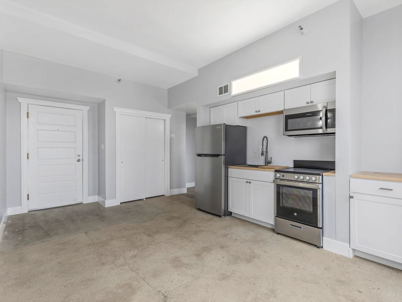 New Grand Apartments - Photo 2 of 50