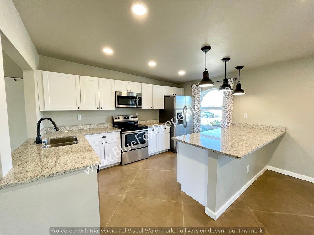 9512 E 29th St - Photo 3 of 31