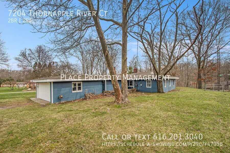 7204 Thornapple River Ct Se - Photo 3 of 27