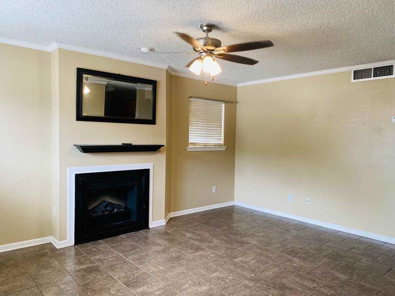 Sharlo Condominiums - AMH LLC - Photo 2 of 14