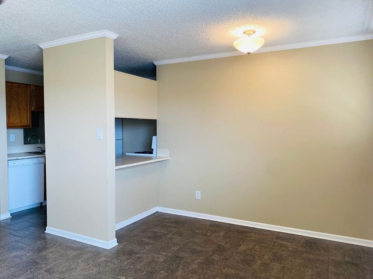 Sharlo Condominiums - AMH LLC - Photo 3 of 14