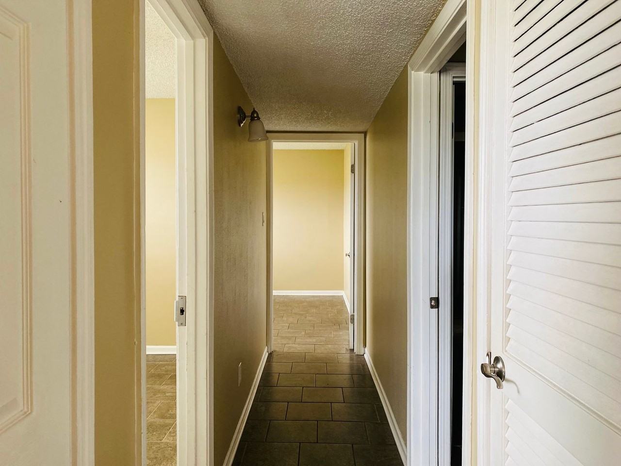 Sharlo Condominiums - AMH LLC - Photo 7 of 14