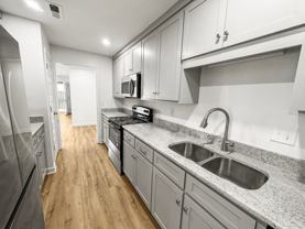 Experience comfortable and stylish living at Westridge Village Apartments - Photo 1 of 1