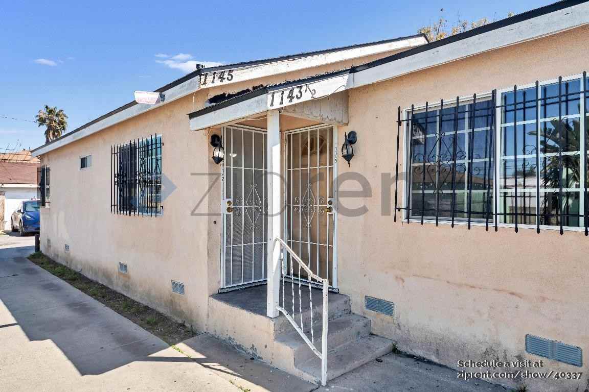 1143 1/2 W 91st St - Photo 2 of 3