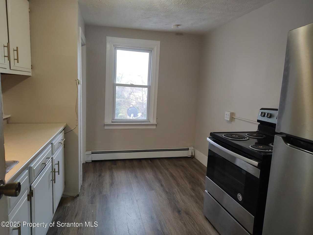 107 2nd St Apt 2nd - Photo 3 of 13