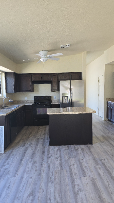 7039 E 38th Pl - Photo 3 of 17
