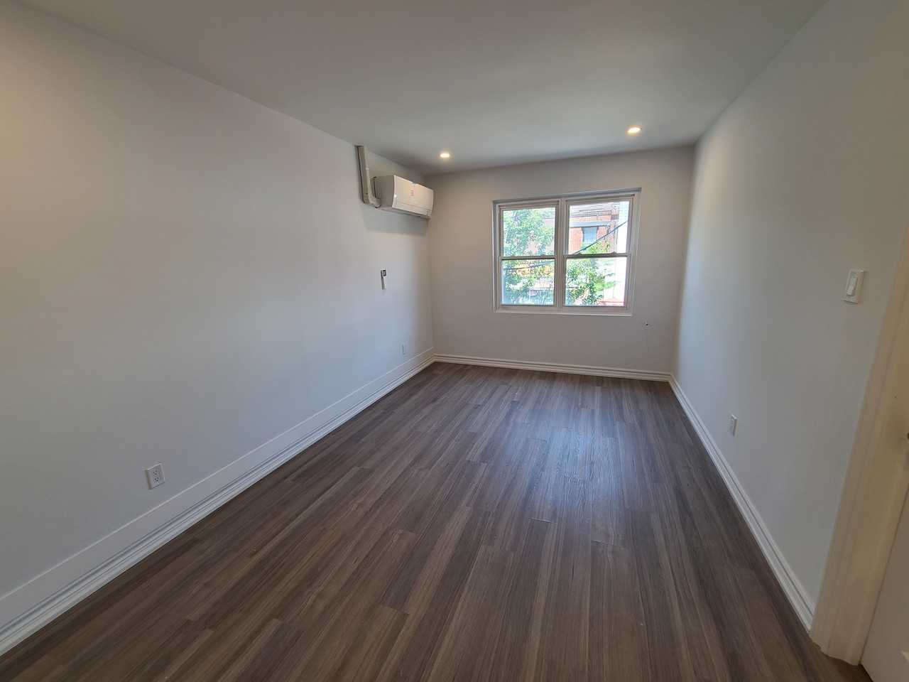 991 Queen Street East #1 - Photo 3 of 10