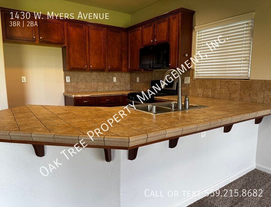 1430 W Myers Ave - Photo 2 of 12