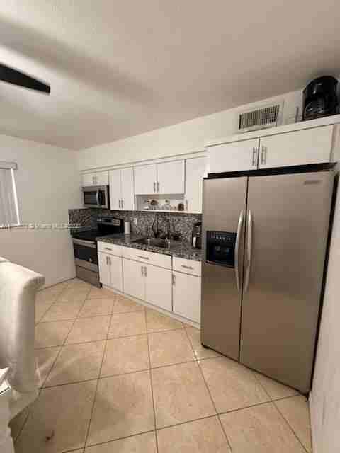661 Ne 61st St #3 - Photo 2 of 8