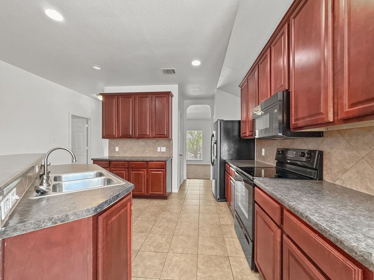 5701 Calcstone Dr - Photo 5 of 18