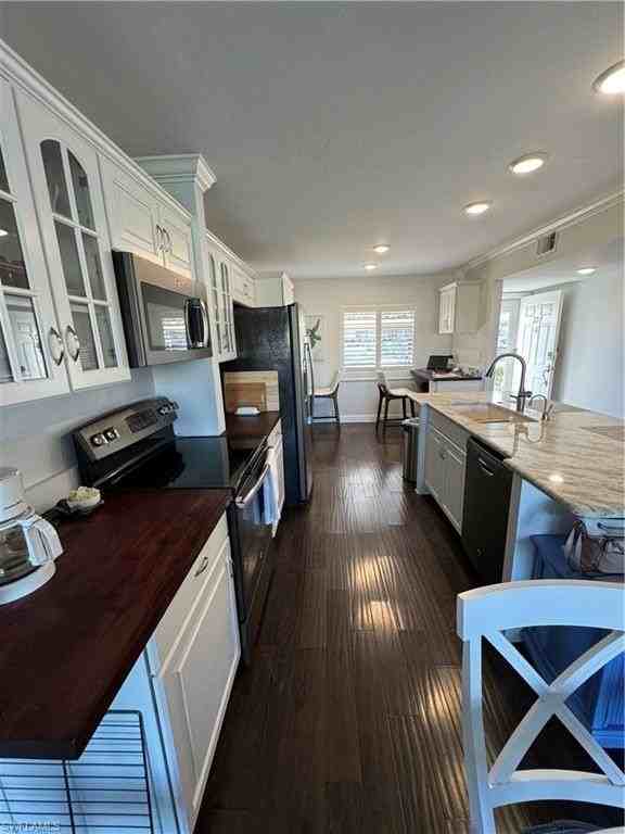 5975 Bloomfield Cir #C107 - Photo 4 of 33