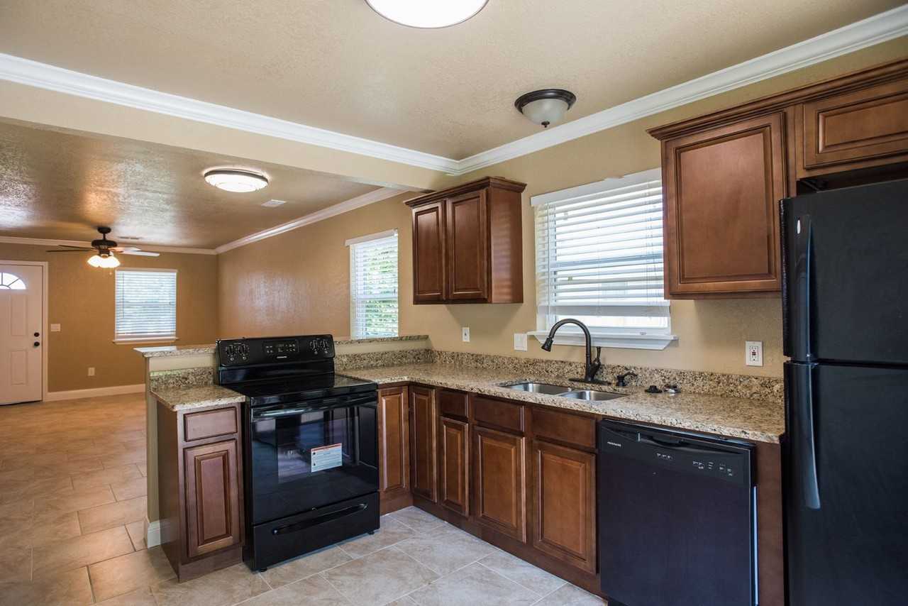 WINDWOOD LANE DUPLEXES - Photo 2 of 15