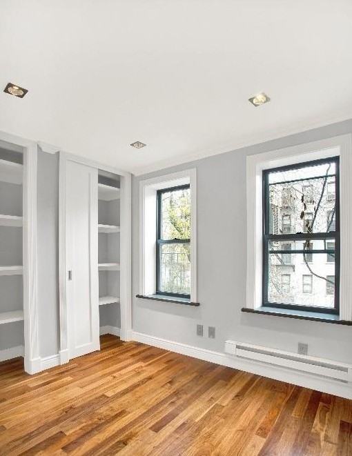 E 6th St #2D3D - Photo 4 of 8