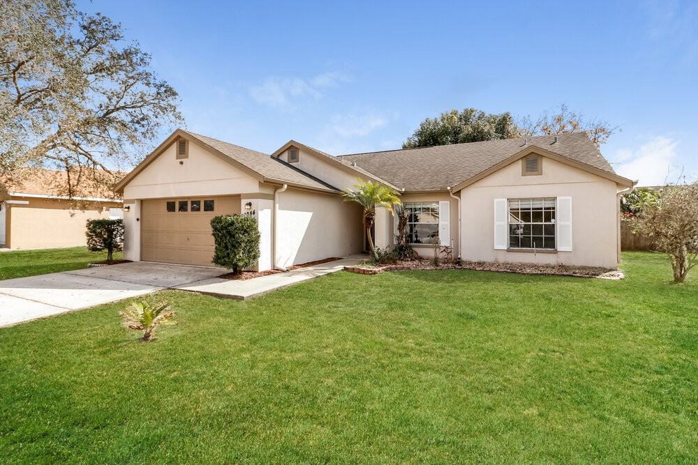 10244 Rainbow Oaks Dr - Photo 2 of 25