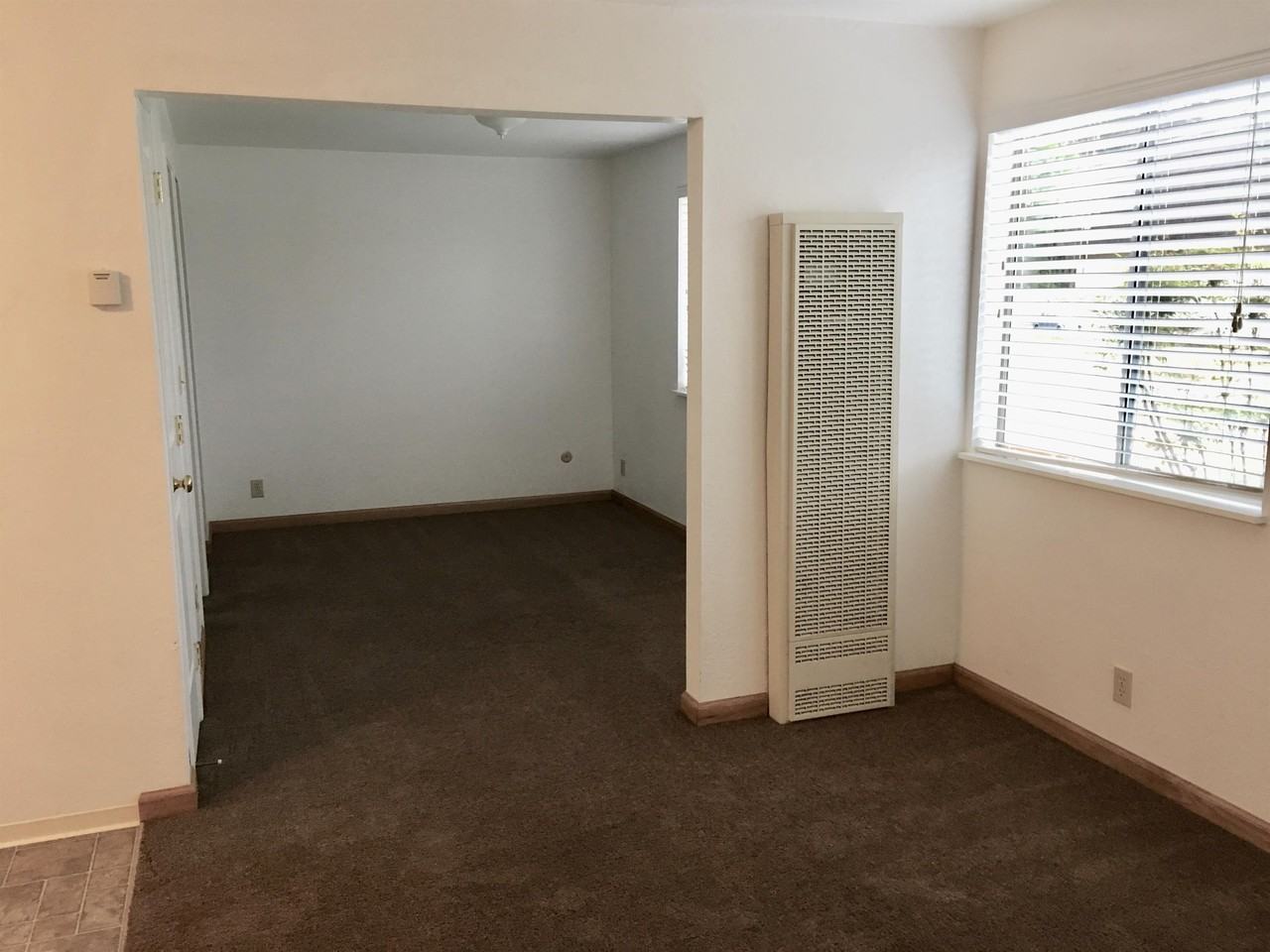 Village Apartments - Photo 2 of 50