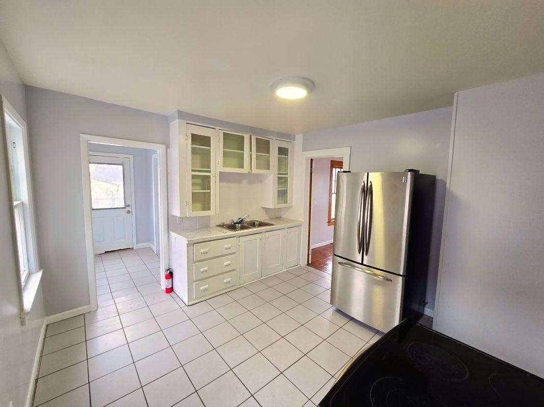 973 Emerson St ##1 - Photo 3 of 8