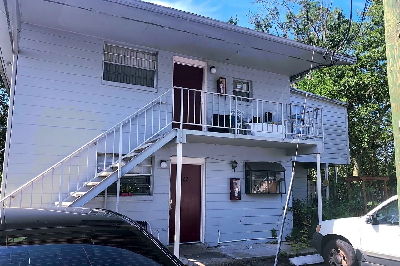 TIMUQUANA GARDENS - Photo 5 of 9