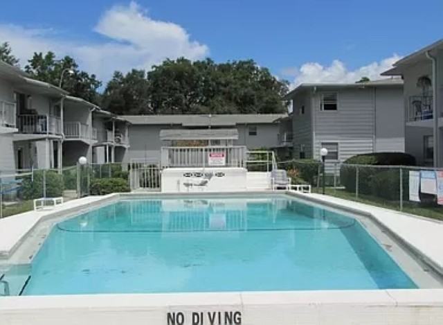 TIMUQUANA GARDENS - Photo 6 of 9