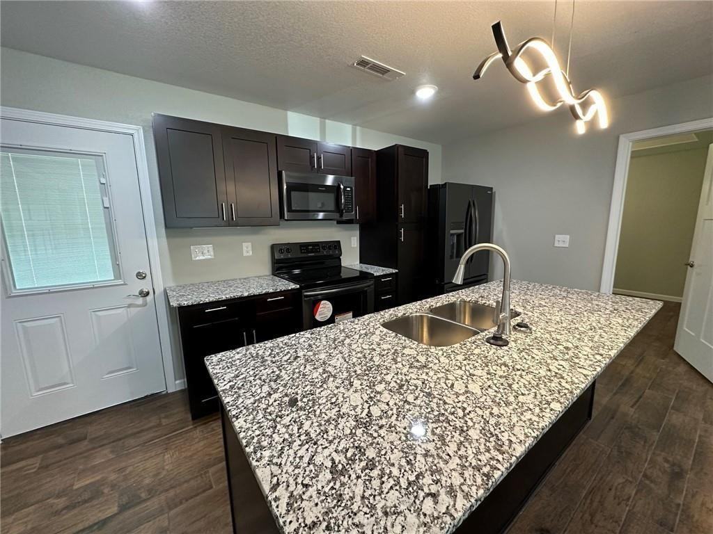 410-412 S Byers Ave - Photo 2 of 25