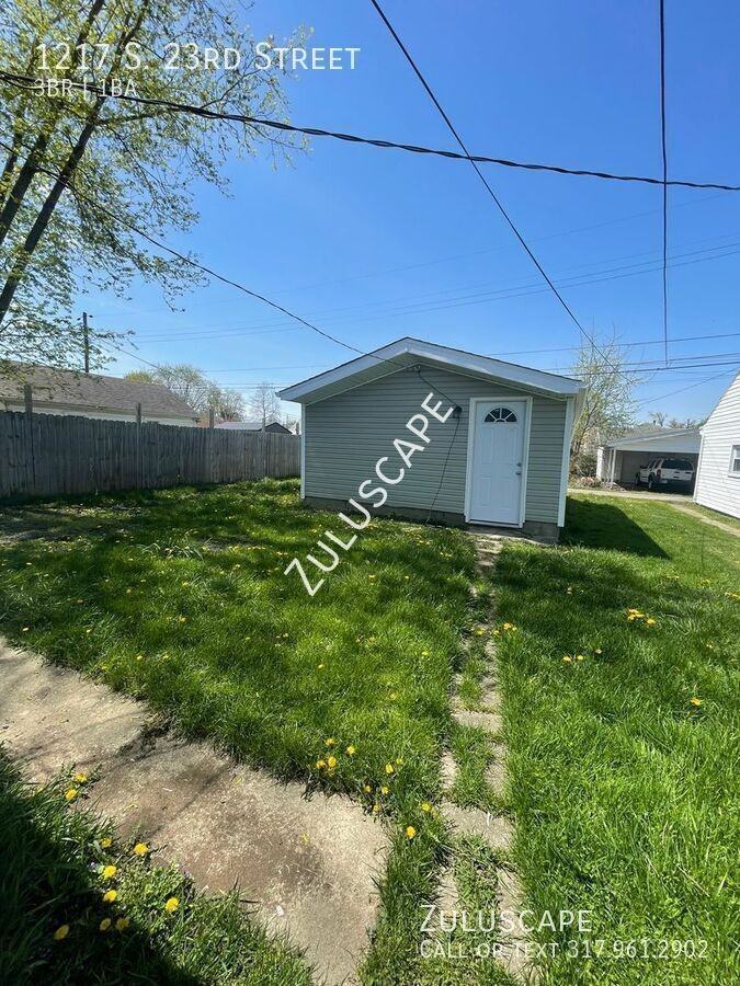 1217 S 23rd St - Photo 2 of 11