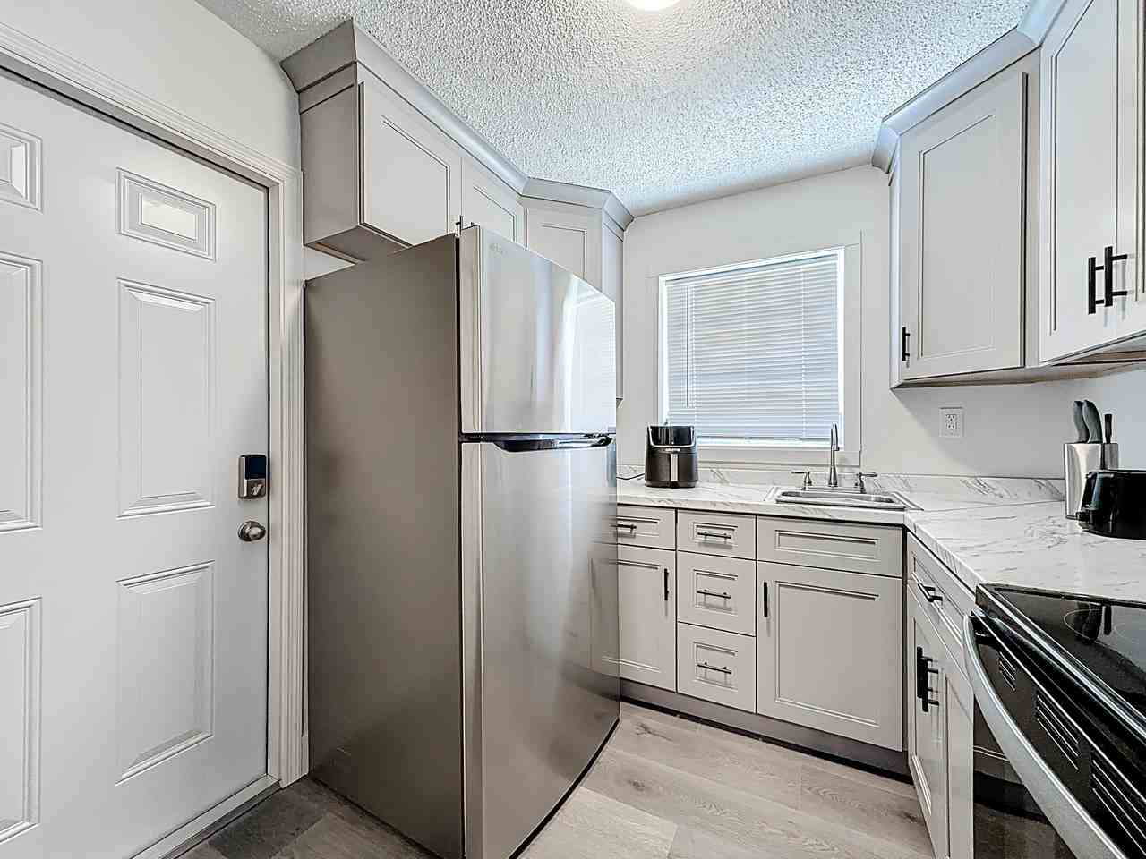 W 34th St - Photo 2 of 5