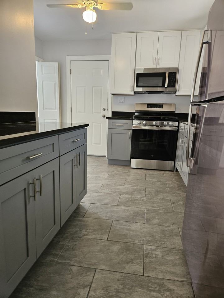 1217 W 63rd Ave #NA - Photo 3 of 13
