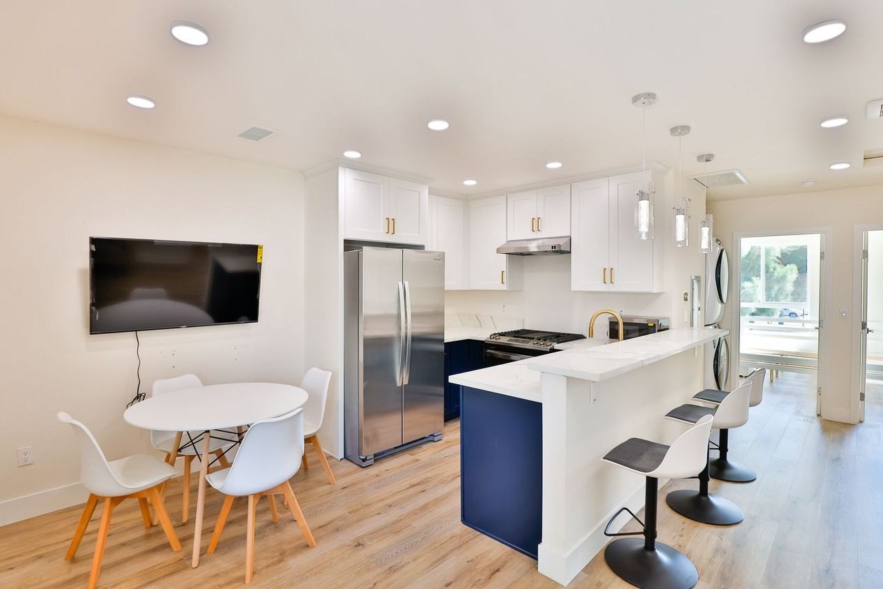 Sagittarius Apartments - Photo 3 of 44