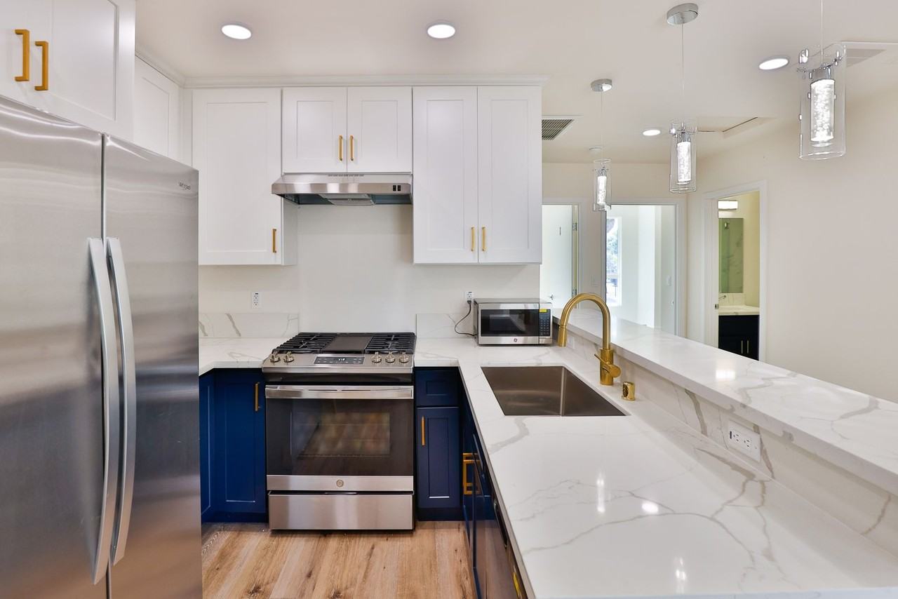 Sagittarius Apartments - Photo 5 of 44