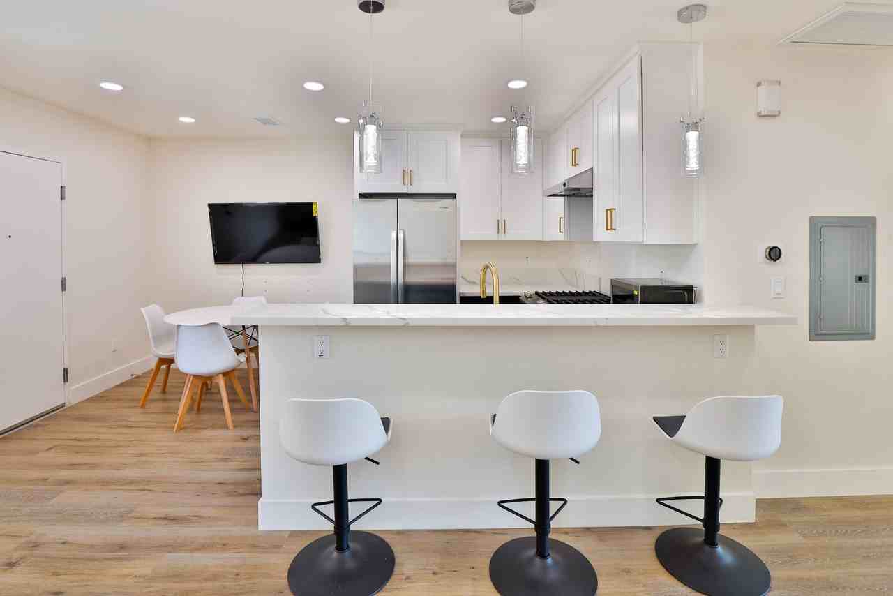 Sagittarius Apartments - Photo 6 of 44