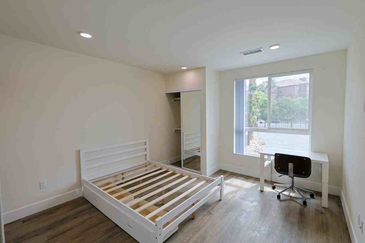 Sagittarius Apartments - Photo 7 of 44