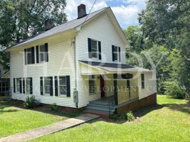featured image of 3304 3304 & 3306 Maple Road NE