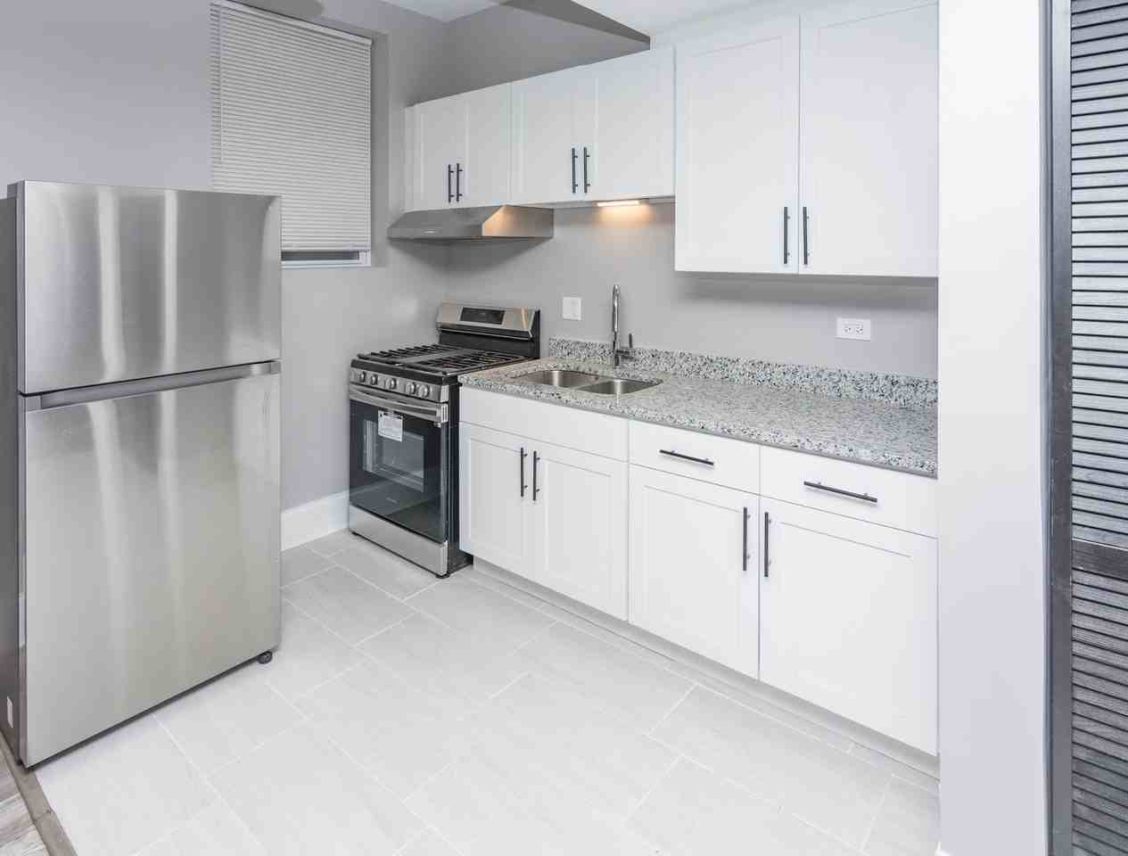 5758 S Green St - Photo 5 of 12