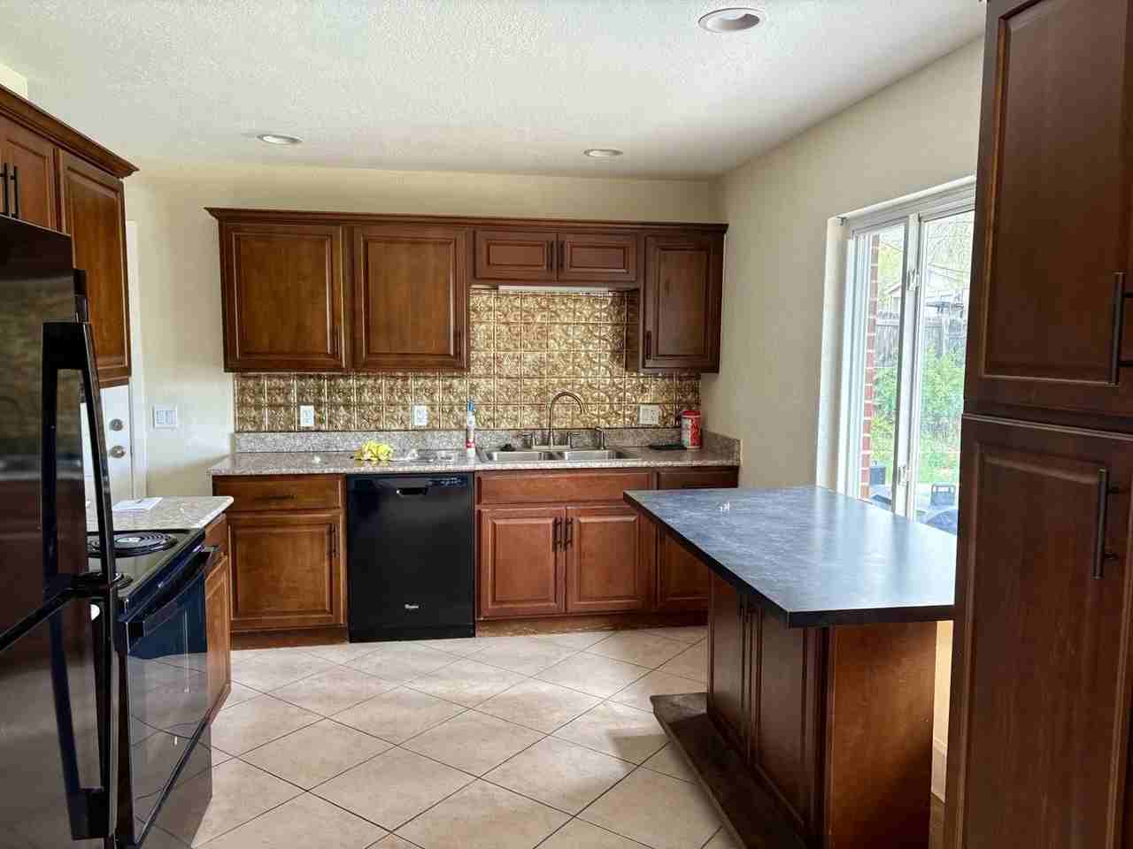 2752 S Zenobia St - Photo 3 of 13