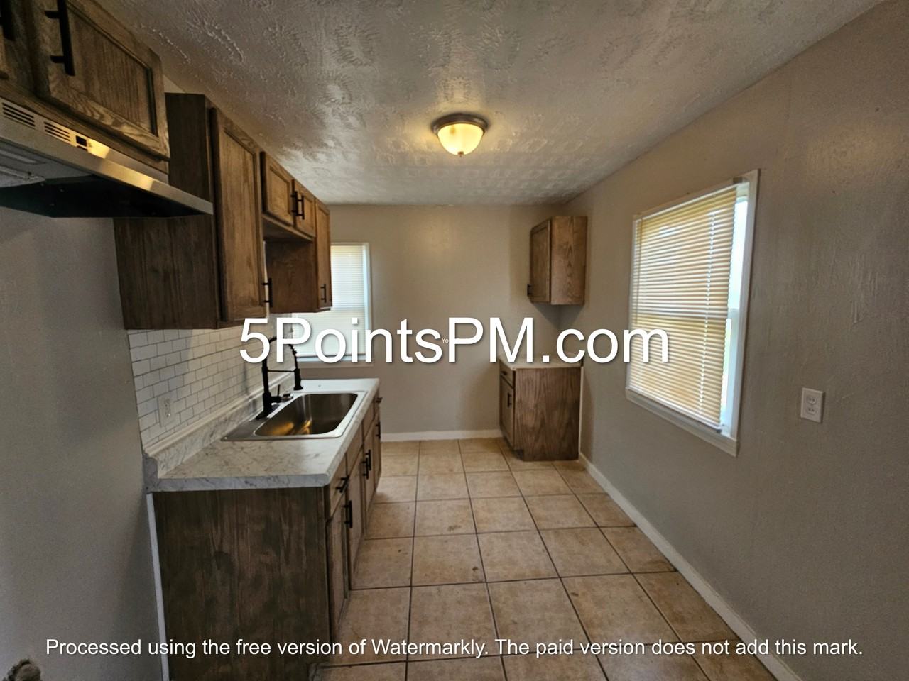 4332 E 143rd St - Photo 3 of 14