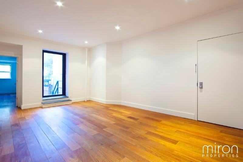 E 4th St #GW - Photo 3 of 7