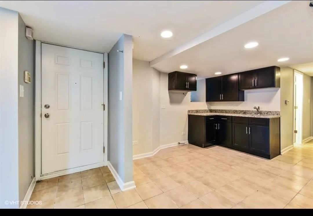 6610 South Rhodes Avenue - Photo 3 of 5