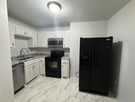 1619 N Vinita Ave - Photo 1 of 1