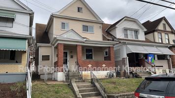 featured image of 403 Ohio Ave #1stFL