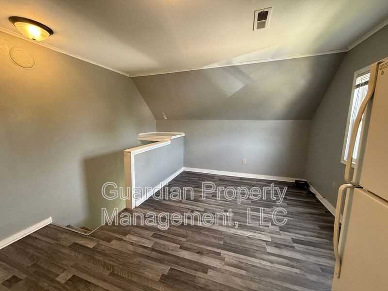 E 3rd St - Photo 3 of 11